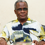 Dr.Tom Adaba